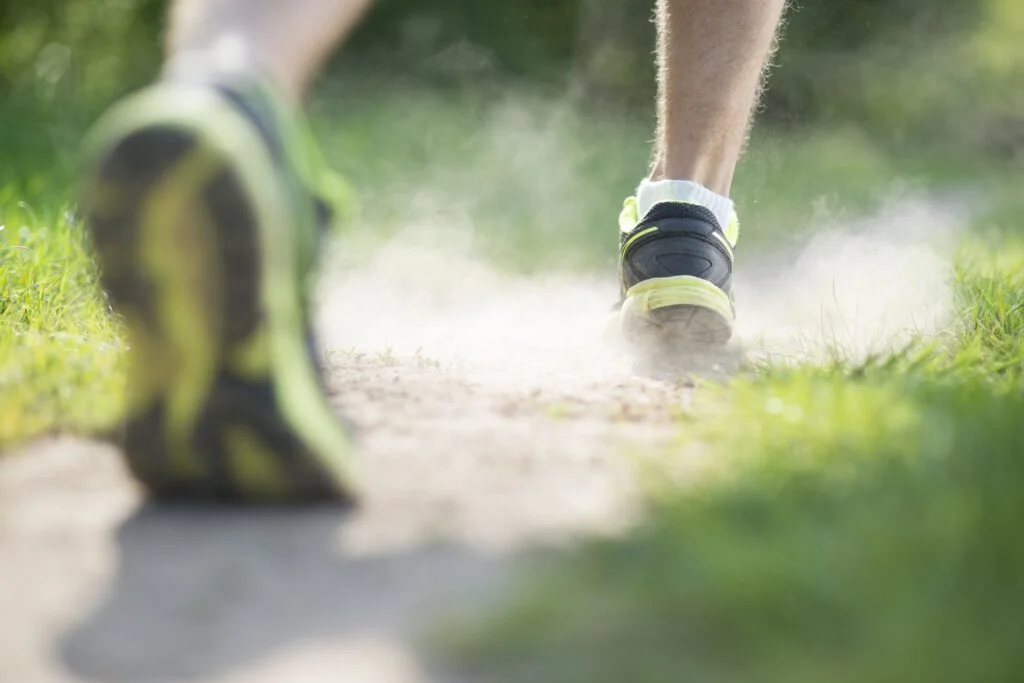 Close-up of a runner's foot.